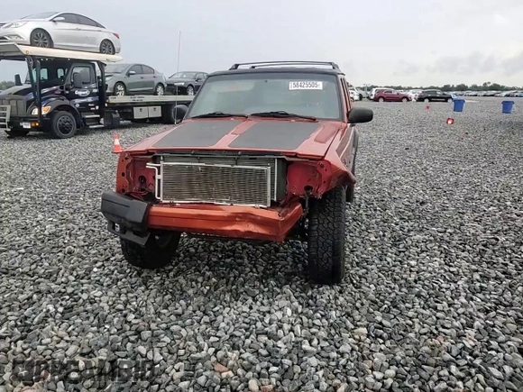 1999 Jeep Cherokee Sport with VIN 1J4FF68S7XL560943, listed as a Copart auction lot 58425505 with 68,654 mi miles and Salvage title. Bid and sale history available at DreamBid. Image 15.
