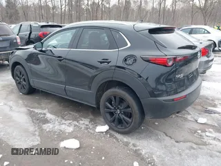 2021 Mazda CX-30 Premium with VIN 3MVDMBDY1MM269353, listed as a IAAI auction lot 41644391 with 29,409 mi miles and . Bid and sale history available at carsss.com. Image 3.