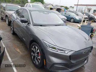 2021 Ford Mustang Mach-E Premium с VIN 3FMTK3R74MMA27709, выставлен на аукционе IAAI как лот 42102335 с пробегом 54 988 миль миль и . История ставок и продаж доступна на DreamBid. Изображение 1.