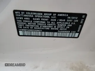 2013 Volkswagen Passat SE with VIN 1VWBN7A39DC029977, listed as a Copart auction lot 46787035 with 106,801 mi miles and Salvage title. Bid and sale history available at DreamBid. Image 14.