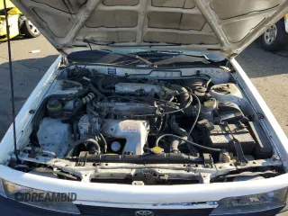 1991 Toyota Camry z VIN 4T1SV24E0MU424347, wystawiony jako Copart lot #42566695 z przebiegiem 162 334 mil mil oraz Szkoda całkowita • Salvage title. Historia ofert i sprzedaży dostępna na DreamBid. Obrazek 11.