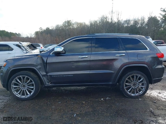 2014 Jeep Grand Cherokee Overland with VIN 1C4RJFCT8EC183165, listed as a IAAI auction lot 41298114 with 114,187 mi miles. Bid and sale history available at carsss.com. Image 14.