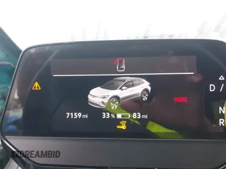 2023 Volkswagen ID.4 Pro z VIN 1V2CMPE88PC028158, wystawiony jako IAAI lot #41538391 z przebiegiem 7159 mil mil oraz . Historia ofert i sprzedaży dostępna na DreamBid. Obrazek 18.