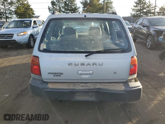 1999 Subaru Forester L with VIN JF1SF6355XG739180, listed as a Copart auction lot 84467674 with 127,591 mi miles and Salvage Title. Bid and sale history available at carsss.com. Image 6.