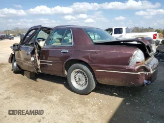 2001 Ford Crown Victoria LX z VIN 2FAFP74W31X189359, wystawiony jako Copart lot #49348255 z przebiegiem Nie podano mil oraz Nie do naprawy. Historia ofert i sprzedaży dostępna na DreamBid. Obrazek 2.