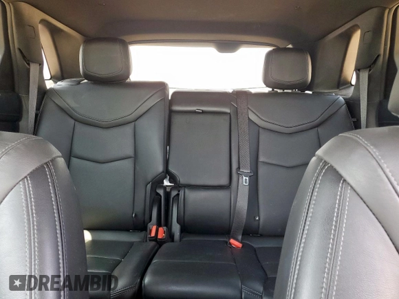 2021 Cadillac XT5 FWD Premium Luxury с VIN 1GYKNCR49MZ202252, выставлен на аукционе Copart как лот 57902235 с пробегом 42 241 миль миль и Списание • Salvage title. История ставок и продаж доступна на DreamBid. Изображение 10.