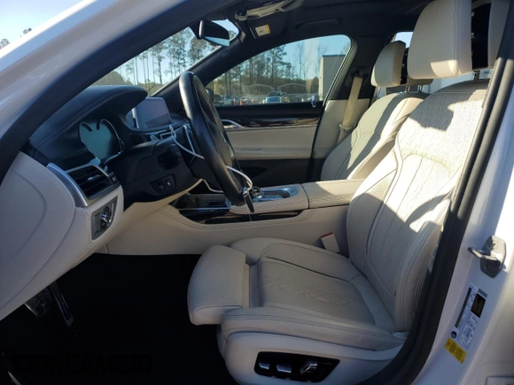 2019 BMW 7 Series 750i with VIN WBA7F0C5XKGM25897, listed as a Copart auction lot 86758004 with 68,700 mi miles and Salvage title. Bid and sale history available at DreamBid. Image 7.