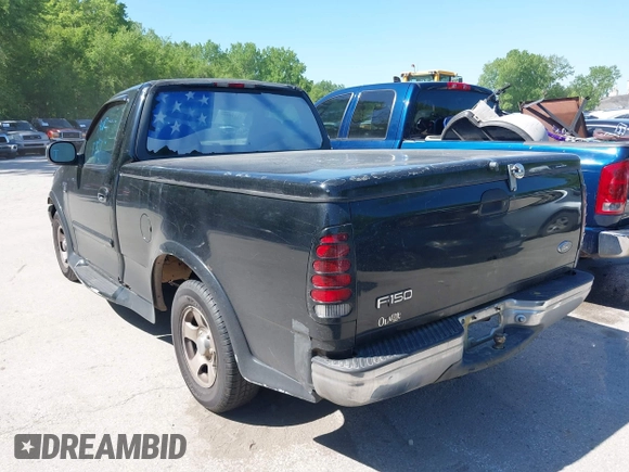 2000 Ford F-150 XL with VIN 1FTRF17L6YKA00872, listed as a IAAI auction lot 42195407 with 210,209 mi miles and . Bid and sale history available at DreamBid. Image 3.
