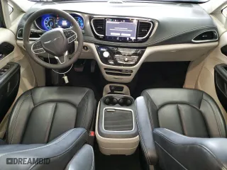 2023 Chrysler Pacifica Hybrid Touring L with VIN 2C4RC1L74PR575358, listed as a Copart auction lot 43261875 with 35,077 mi miles and Clean Title. Bid and sale history available at carsss.com. Image 8.