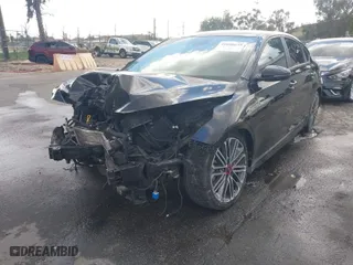 2021 Kia Forte GT with VIN 3KPF44AC9ME369516, listed as a IAAI auction lot 41690655 with 65,149 mi miles. Bid and sale history available at carsss.com. Image 2.