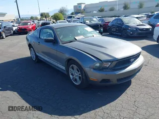 2012 Ford Mustang V6 Premium with VIN 1ZVBP8AM8C5265077, listed as a IAAI auction lot 41899887 with 139,915 mi miles. Bid and sale history available at carsss.com. Image 1.