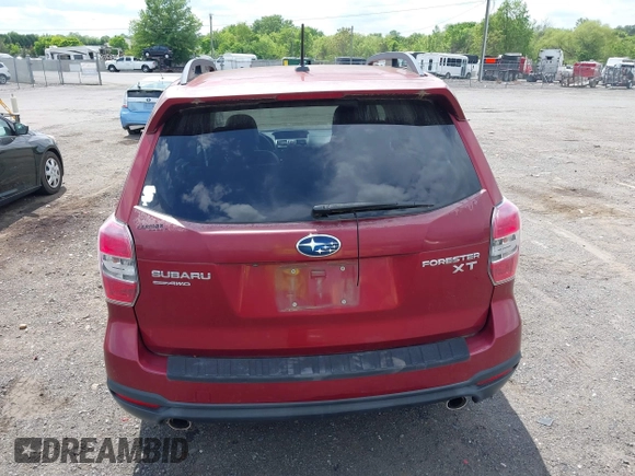 2014 Subaru Forester XT Touring with VIN JF2SJGMC1EH500150, listed as a IAAI auction lot 42201409 with 106,728 mi miles and . Bid and sale history available at DreamBid. Image 16.