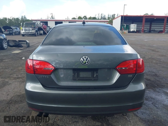 2014 Volkswagen Jetta SE with VIN 3VWD07AJ9EM277085, listed as a IAAI auction lot 42531957 with 171,613 mi miles and . Bid and sale history available at DreamBid. Image 17.