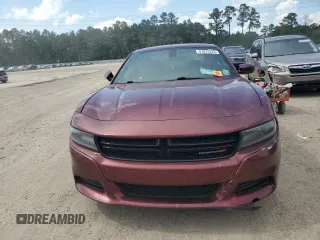 2019 Dodge Charger SXT with VIN 2C3CDXBG4KH721185, listed as a Copart auction lot 57872325 with 123,429 mi miles and Salvage title. Bid and sale history available at DreamBid. Image 5.