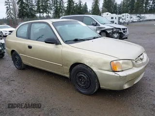 2002 Hyundai Accent GL with VIN KMHCG35CX2U199532, listed as a IAAI auction lot 41839270 with 200,232 mi miles. Bid and sale history available at carsss.com. Image 1.