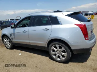 2015 Cadillac SRX Performance Collection with VIN 3GYFNCE37FS585204, listed as a Copart auction lot 59966935 with 50,781 mi miles and Salvage title. Bid and sale history available at DreamBid. Image 2.