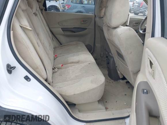 2006 Hyundai Tucson GLS with VIN KM8JN72D26U322893, listed as a IAAI auction lot 41882842 with 116,972 mi miles. Bid and sale history available at carsss.com. Image 8.