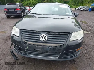 2010 Volkswagen Passat Komfort with VIN WVWJM7AN6AE154387, listed as a IAAI auction lot 42371628 with 145,054 mi miles and . Bid and sale history available at DreamBid. Image 12.