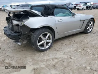 2009 Saturn Sky Red Line z VIN 1G8MT35X89Y103952, wystawiony jako Copart lot #80772714 z przebiegiem 83 835 mil mil oraz Szkody całkowita. Historia ofert i sprzedaży dostępna na DreamBid. Obrazek 3.