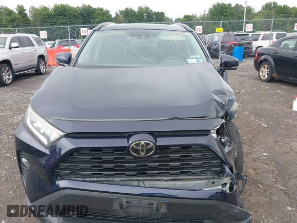 2019 Toyota RAV4 XLE with VIN 2T3P1RFVXKC057616, listed as a IAAI auction lot 42685158 with 148,661 mi miles and . Bid and sale history available at DreamBid. Image 13.