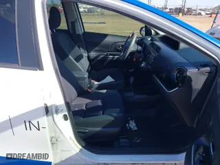 2016 Toyota Prius c One with VIN JTDKDTB34G1121639, listed as a IAAI auction lot 41890180 with 141,080 mi miles. Bid and sale history available at carsss.com. Image 5.