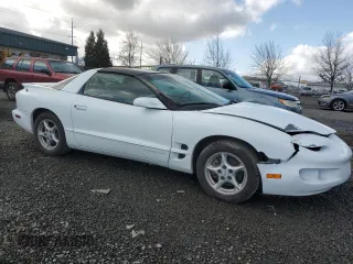 2001 Pontiac Firebird Formula z VIN 2G2FV22G112116104, wystawiony jako Copart lot #47191405 z przebiegiem 66 990 mil mil oraz Szkody całkowita. Historia ofert i sprzedaży dostępna na DreamBid. Obrazek 4.