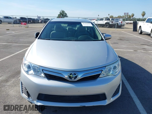 2014 Toyota Camry L with VIN 4T4BF1FK5ER442960, listed as a IAAI auction lot 42206639 with 119,639 mi miles and . Bid and sale history available at DreamBid. Image 12.