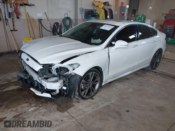 2019 Ford Fusion Titanium with VIN 3FA6P0D92KR153096, listed as a IAAI auction lot 41679393 with 127,292 mi miles and . Bid and sale history available at DreamBid. Image 18.