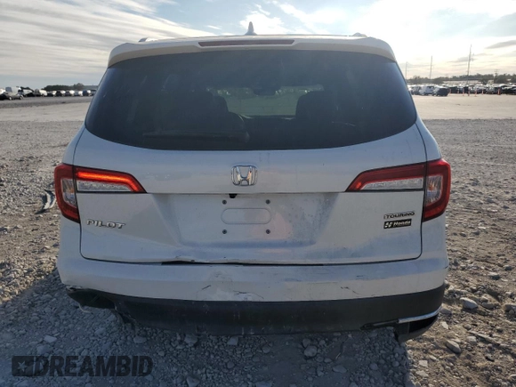 2022 Honda Pilot Touring 7-Passenger with VIN 5FNYF5H65NB011768, listed as a Copart auction lot 74134503 with 27,517 mi miles and Salvage title. Bid and sale history available at DreamBid. Image 6.