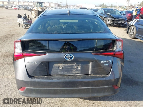 2022 Toyota Prius L Eco with VIN JTDKAMFUXN3188930, listed as a IAAI auction lot 42275661 with 116,934 mi miles and . Bid and sale history available at DreamBid. Image 16.