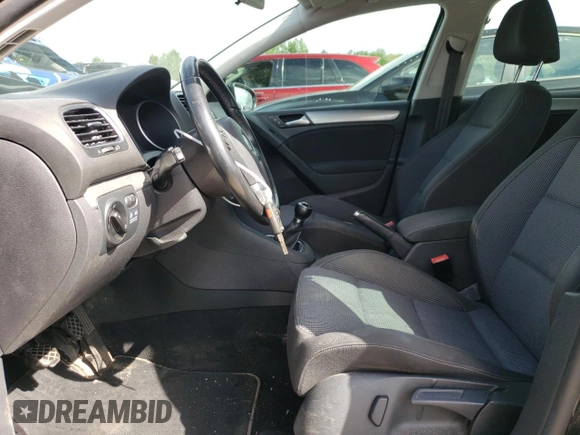 2012 Volkswagen Golf TDI with VIN WVWNM7AJ9CW148367, listed as a Copart auction lot 69002904 with 77,987 mi miles and Salvage title. Bid and sale history available at DreamBid. Image 7.