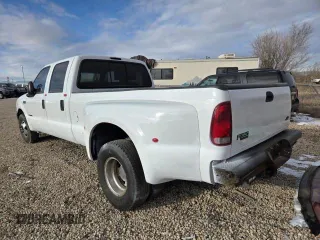 1999 Ford F-350 XL z VIN 1FTWW32F4XED65158, wystawiony jako Copart lot #41690765 z przebiegiem 147 314 mil mil oraz Czysty tytuł • Clean title. Historia ofert i sprzedaży dostępna na DreamBid. Obrazek 3.