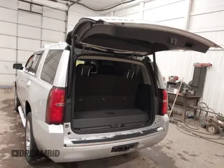 2016 Chevrolet Tahoe LTZ z VIN 1GNSKCKCXGR284827, wystawiony jako IAAI lot #41389540 z przebiegiem 93 150 mil mil oraz . Historia ofert i sprzedaży dostępna na DreamBid. Obrazek 3.