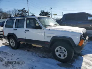 1994 Jeep Cherokee Sport with VIN 1J4FJ68S5RL135545, listed as a Copart auction lot 42397255 with 199,054 mi miles and Salvage Title. Bid and sale history available at carsss.com. Image 4.
