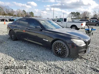 2015 BMW 7 Series 750Li with VIN WBAYE8C58FD782122, listed as a Copart auction lot 86204934 with 139,052 mi miles and Salvage Title. Bid and sale history available at carsss.com. Image 4.