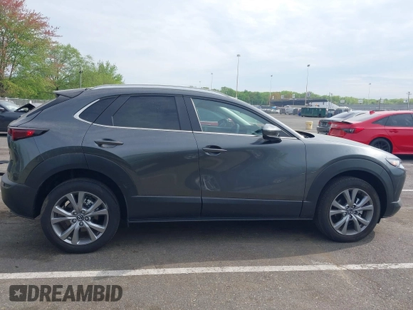 2024 Mazda CX-30 S Carbon Edition with VIN 3MVDMBCM5RM665341, listed as a IAAI auction lot 42180459 with 4,496 mi miles and . Bid and sale history available at DreamBid. Image 13.