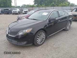 2013 Lincoln MKS z VIN 1LNHL9EK0DG600129, wystawiony jako IAAI lot #42314913 z przebiegiem 119 674 mil mil oraz . Historia ofert i sprzedaży dostępna na DreamBid. Obrazek 18.