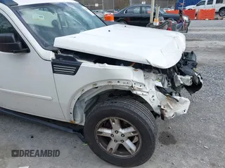 2007 Dodge Nitro SXT with VIN 1D8GU28K77W727391, listed as a IAAI auction lot 41869288 with 214,920 mi miles. Bid and sale history available at carsss.com. Image 17.