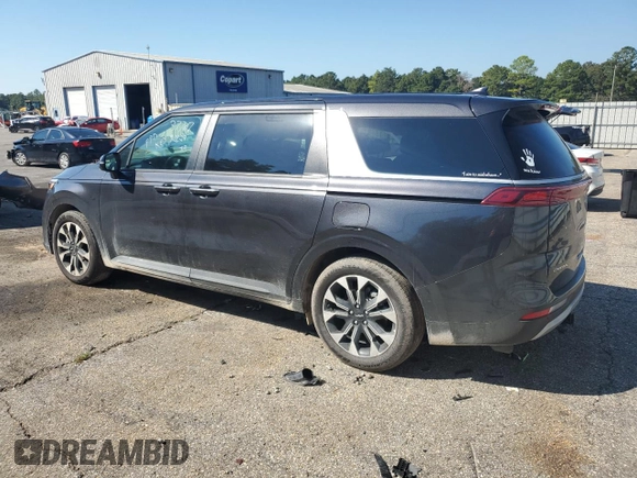 2024 Kia Carnival EX with VIN KNDNC5H39R6440916, listed as a Copart auction lot 74666894 with 6,948 mi miles and Salvage Title. Bid and sale history available at carsss.com. Image 2.