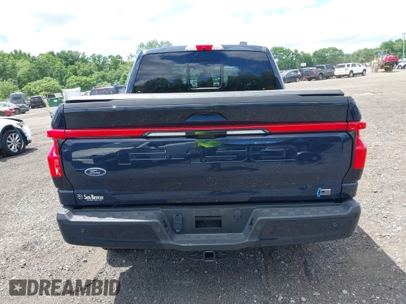 2023 Ford F-150 Lightning Pro с VIN 1FT6W1EVXPWG42428, выставлен на аукционе IAAI как лот 39711091 с пробегом 6 308 миль миль и . История ставок и продаж доступна на DreamBid. Изображение 16.