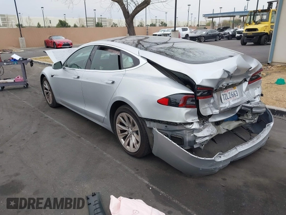 2017 Tesla Model S 60 with VIN 5YJSA1E17HF189627, listed as a IAAI auction lot 41891766 with 106,003 mi miles and . Bid and sale history available at DreamBid. Image 3.