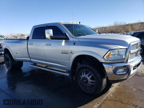 2014 Ram 3500 Laramie with VIN 3C63RRJL6EG165917, listed as a Copart auction lot 81898684 with 207,928 mi miles and Salvage Title. Bid and sale history available at carsss.com. Image 4.