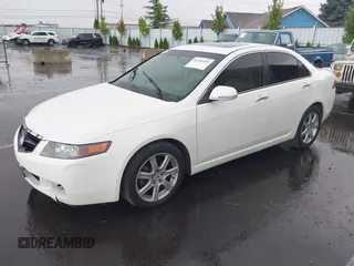 2004 Acura TSX with VIN JH4CL96884C021140, listed as a IAAI auction lot 42540399 with 248,040 mi miles and . Bid and sale history available at DreamBid. Image 2.