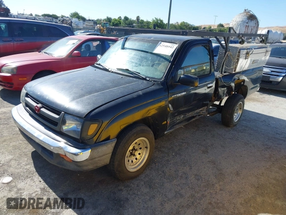 1997 Toyota Tacoma with VIN 4TANL42N2VZ229338, listed as a IAAI auction lot 42540942 with 208,426 mi miles and . Bid and sale history available at DreamBid. Image 2.