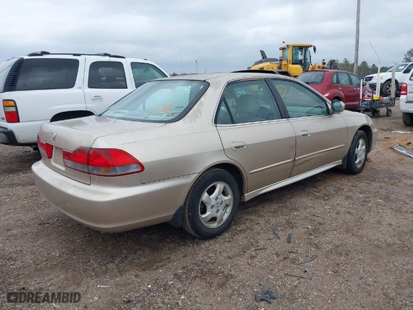 2002 Honda Accord Sdn EX with VIN 1HGCG56612A025943, listed as a IAAI auction lot 41504592 with 191,687 mi miles. Bid and sale history available at carsss.com. Image 4.