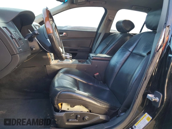 2009 Cadillac STS AWD with VIN 1G6DD67VX90137540, listed as a Copart auction lot 42062184 with 153,969 mi miles and Clean Title. Bid and sale history available at DreamBid. Image 7.