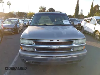2003 Chevrolet Suburban LS with VIN 1GNEC16T43J269726, listed as a IAAI auction lot 41109855 with 122,820 mi miles. Bid and sale history available at carsss.com. Image 12.