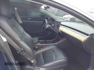 2018 Tesla Model 3 Long Range Battery with VIN 5YJ3E1EA7JF012249, listed as a IAAI auction lot 41782972 with 103,412 mi miles. Bid and sale history available at carsss.com. Image 5.