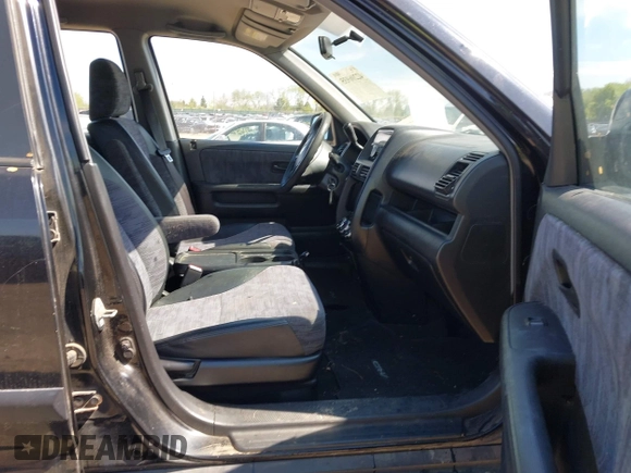 2002 Honda CR-V LX with VIN JHLRD68402C018458, listed as a IAAI auction lot 42206935 with 212,229 mi miles and . Bid and sale history available at carsss.com. Image 5.