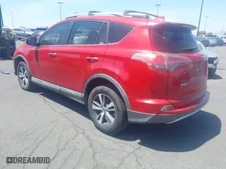 2016 Toyota RAV4 XLE with VIN 2T3WFREV3GW239632, listed as a IAAI auction lot 41860727 with 135,850 mi miles. Bid and sale history available at carsss.com. Image 3.